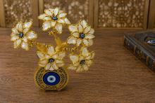 ARBOL OJO TURCO CON FLORES COLOR BLANCO Y BASE OJO TURCO COLOR DORADO 20 X 17 CM. ARBOL OJO TURCO CON FLORES COLOR BLANCO Y BASE OJO TURCO COLOR DORADO 20 X 17 CM.