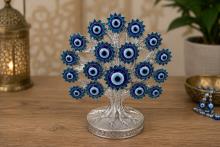 ARBOL OJO TURCO CON TRONCO Y RAMAS COLOR PLATEADO Y FLORES COLOR AZUL 15 X 14 CM. ARBOL OJO TURCO CON TRONCO Y RAMAS COLOR PLATEADO Y FLORES COLOR AZUL 15 X 14 CM.