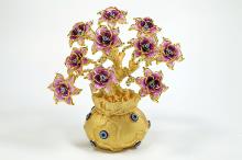 ARBOL OJO TURCO DORADO CON BASE SACO DE LA PROSPERIDAD Y FLORES LILAS 22 CM. ARBOL OJO TURCO DORADO CON BASE SACO DE LA PROSPERIDAD Y FLORES LILAS 22 CM.